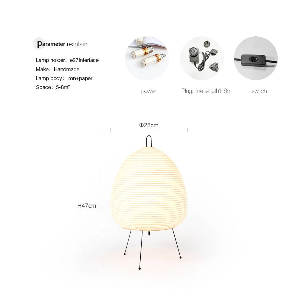 Japanese style rice paper table lamp with handmade shade and aluminium base on wooden surface