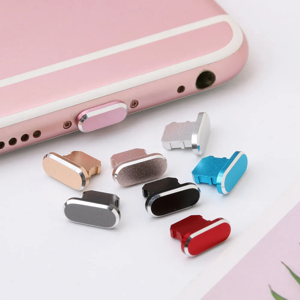 Aluminium alloy dust plug for iPhone charging port in various colours including gold, silver and rose gold.