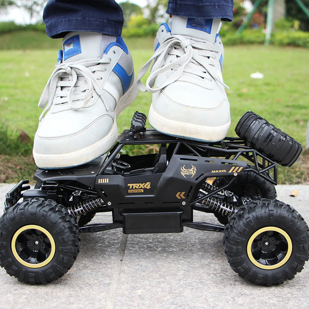 Large black 4WD remote control climbing car with 2.4G wireless controller