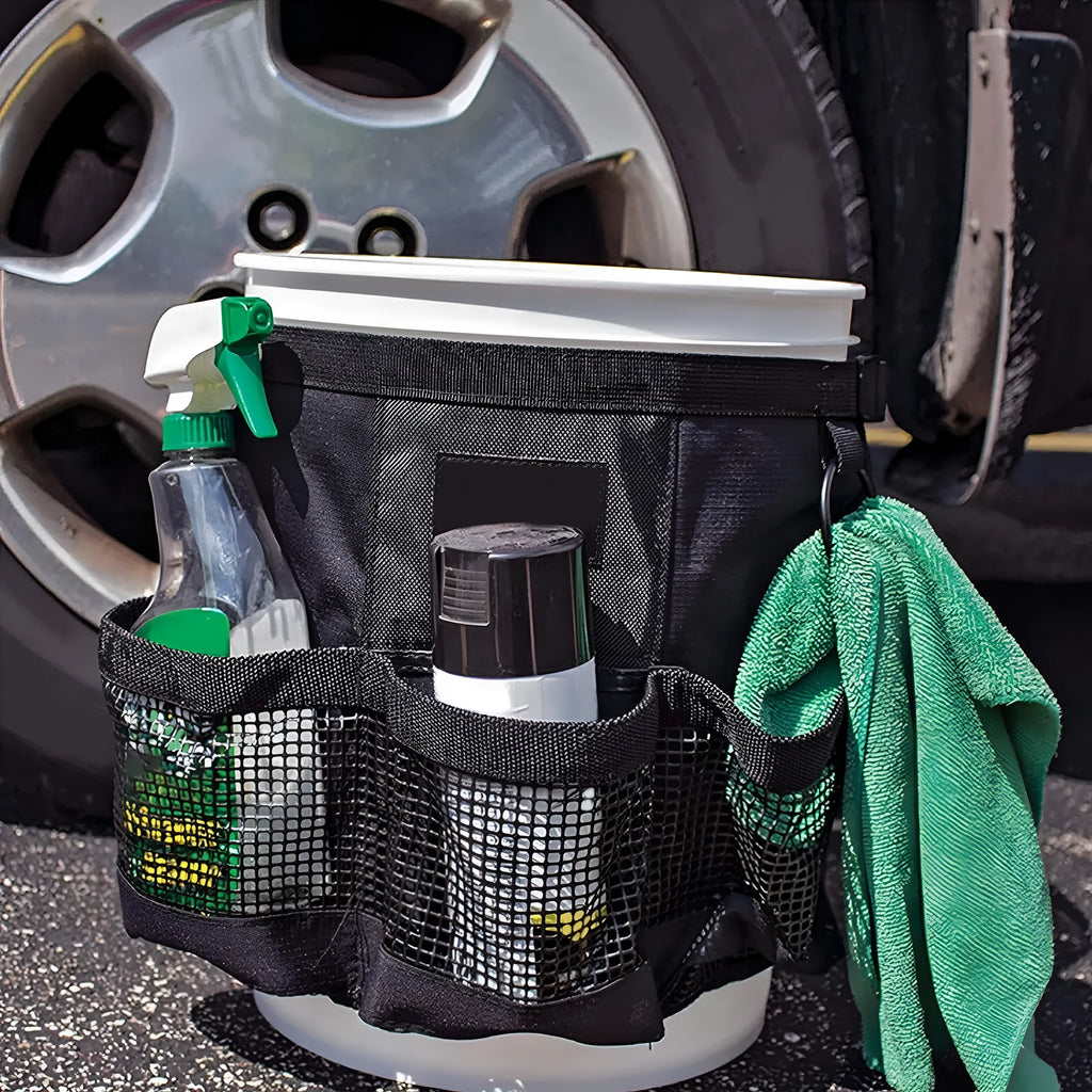 Black cylindrical polyester hanging storage bag designed to fit a 5 gallon barrel.