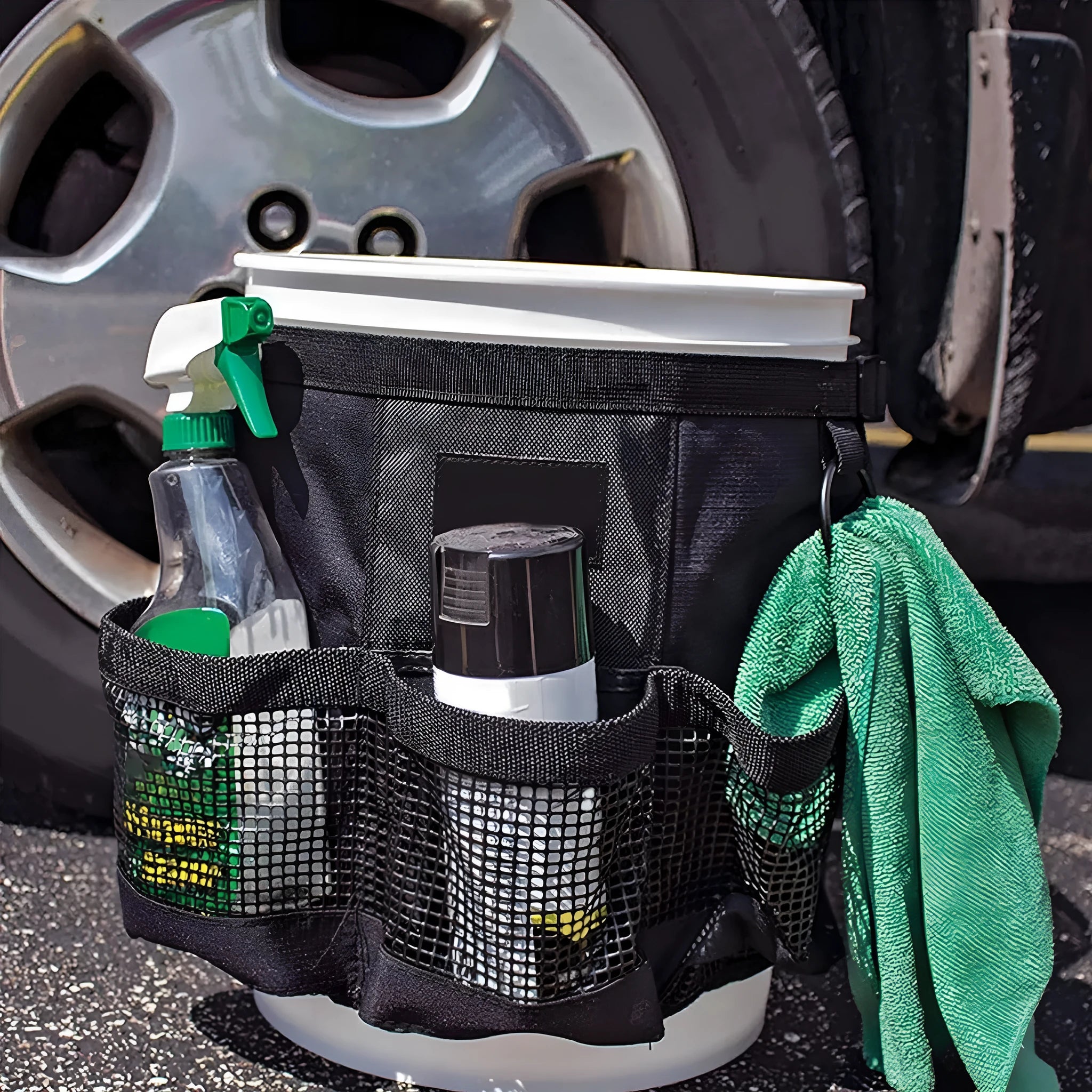 Black cylindrical polyester hanging storage bag designed to fit a 5 gallon barrel.