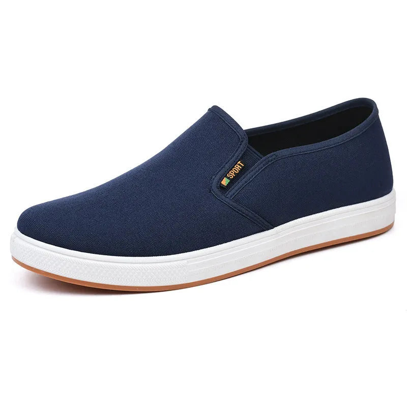 Men's black and blue canvas slip-on shoes with round toe and low-top design