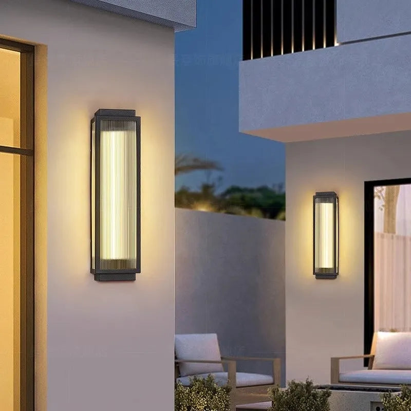 Stainless steel waterproof outdoor wall light fixture for garden or courtyard mounting.