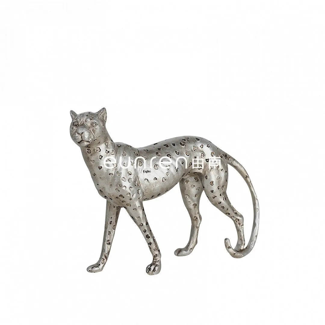 Leopard resin home ornament in American Leopard colour on wooden surface