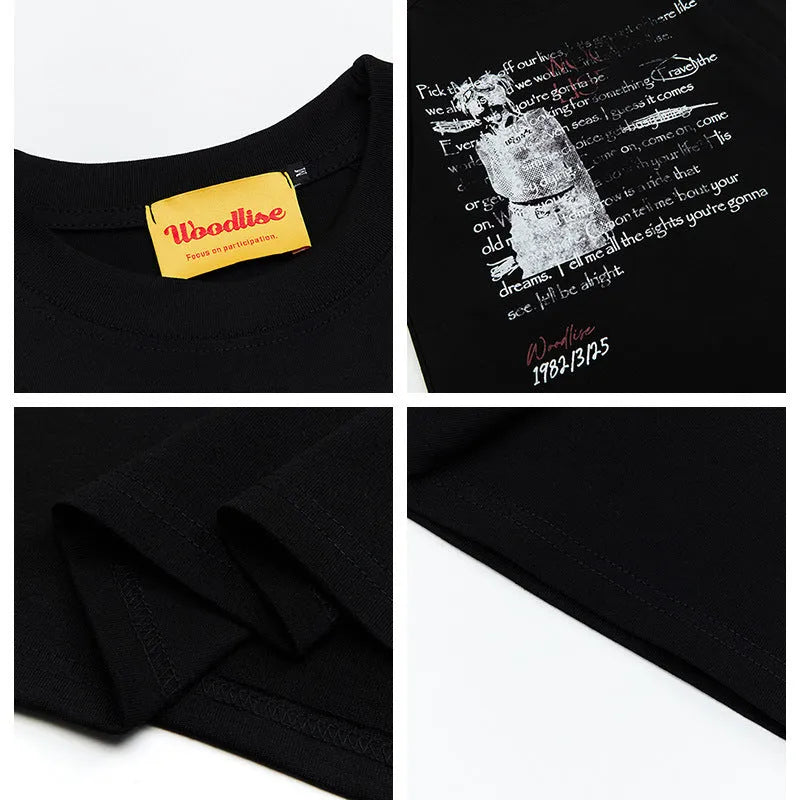 Men's black loose fit cotton t-shirt with white printed letter design and raglan sleeves