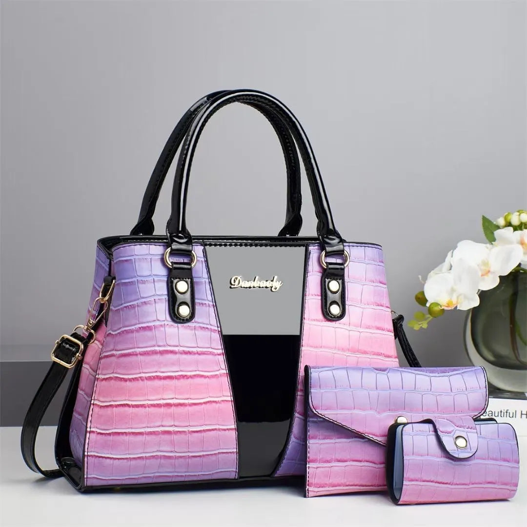 Women's crocodile stitch three-piece shoulder bag set in PU leather showing main bag and two smaller pouches