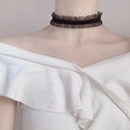 Alloy clavicle necklace with velvet ruffled flower pendant and snake bones chain in black, light coffee, or white.