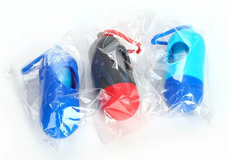 Roll of multi-colour dog waste bags showing black blue green pink purple and red black options