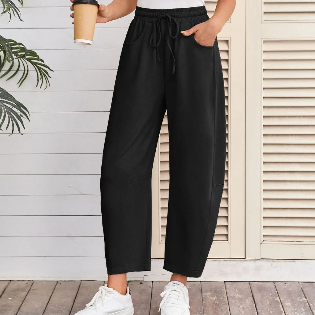 Loose cropped cotton sweatpants with elastic waist and pockets in multiple colour options