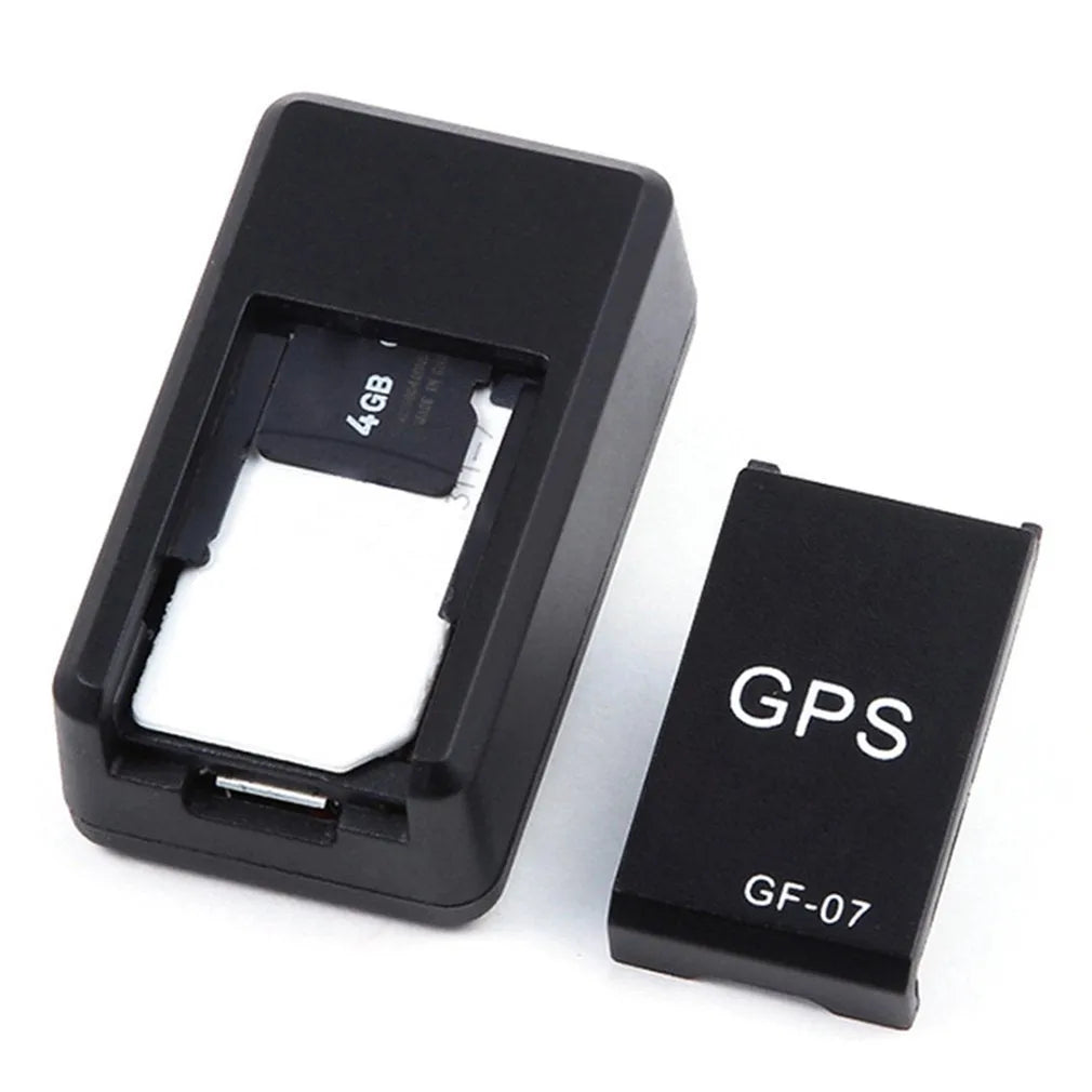 Black magnetic mini GPS tracker device with compact 35mm dimensions for vehicle tracking
