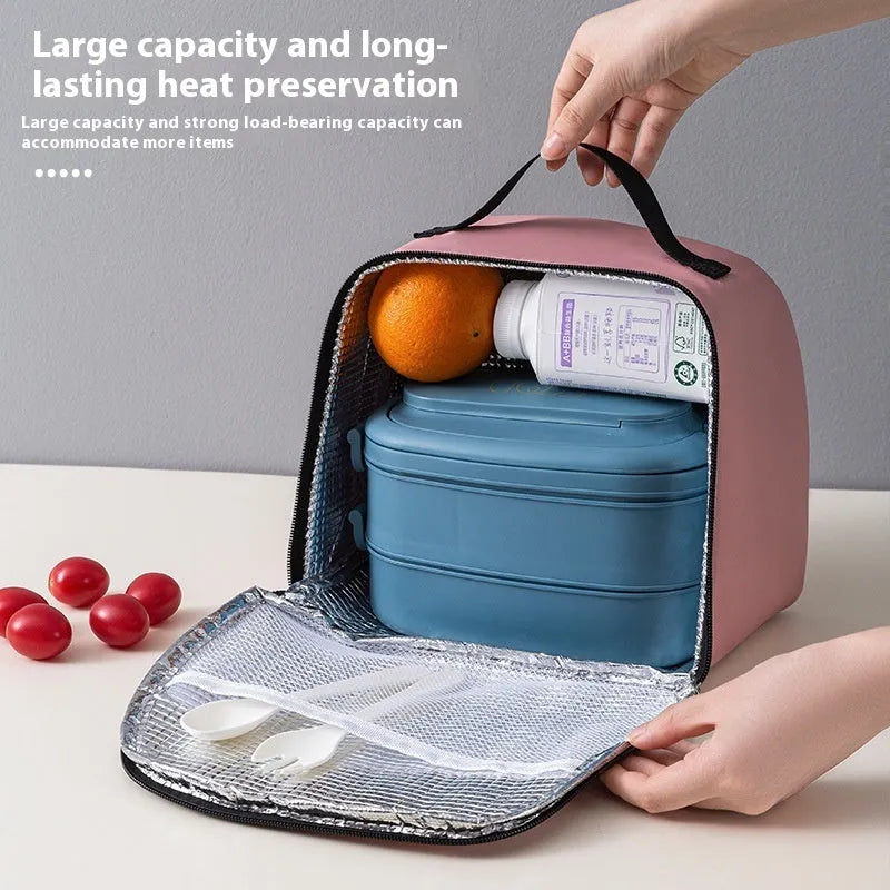 Textured cloth insulated lunch bag in sapphire blue colour with bento handbag design
