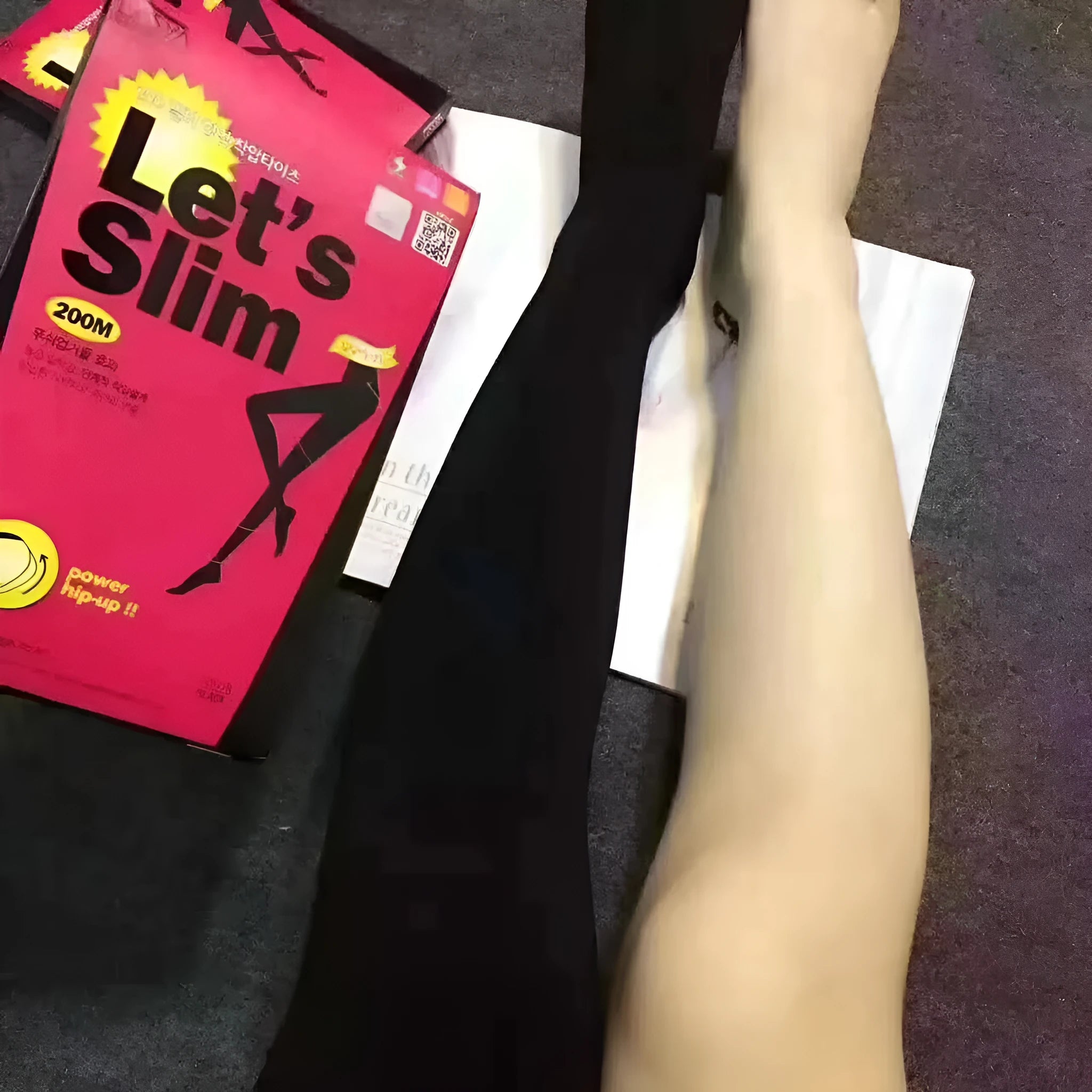 Beige and black stovepipe shaping socks for hip and abdomen support in polyester fibre material.