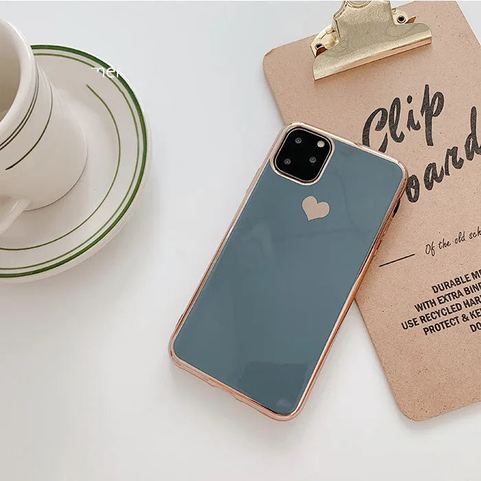 Solid colour TPU smartphone back cover case for iPhone models on a plain background.