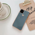Solid colour TPU smartphone back cover case for iPhone models on a plain background.