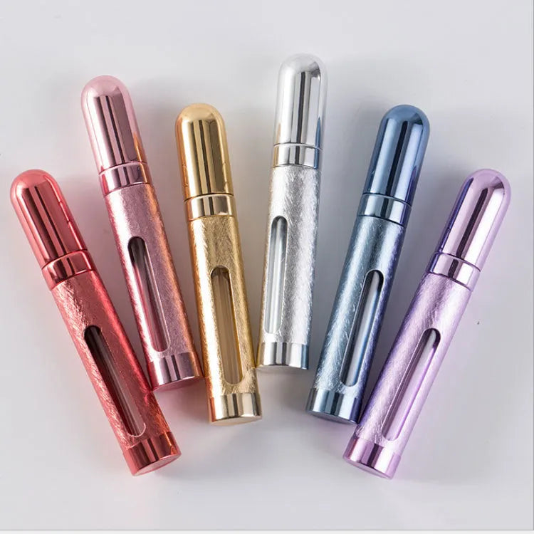 Slim 12ml aluminium bullet-style travel perfume atomiser bottle in a choice of metallic colours.
