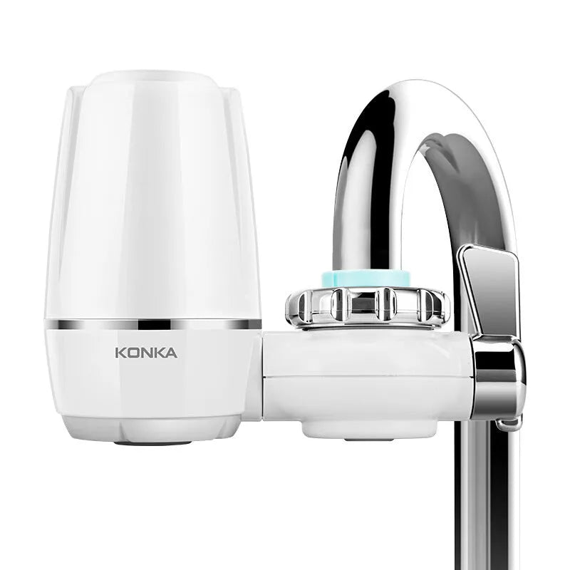 White plastic kitchen tap water filter with universal adapter and ceramic cartridge