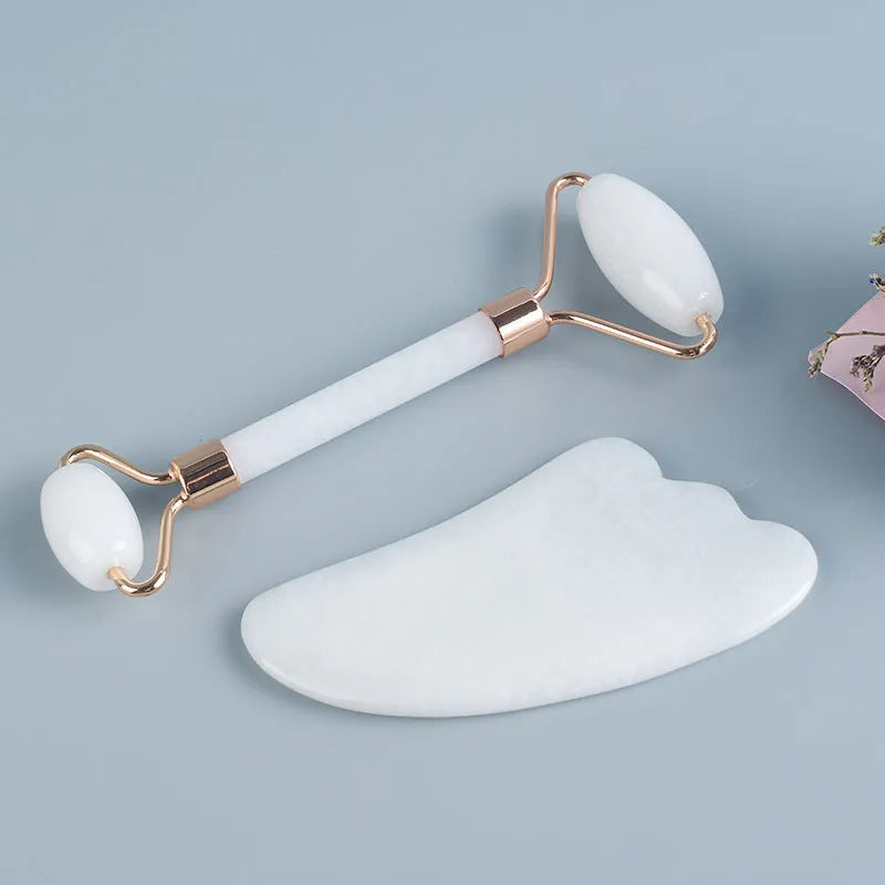 Natural white jade double-headed roller and scraping claw set with storage board.