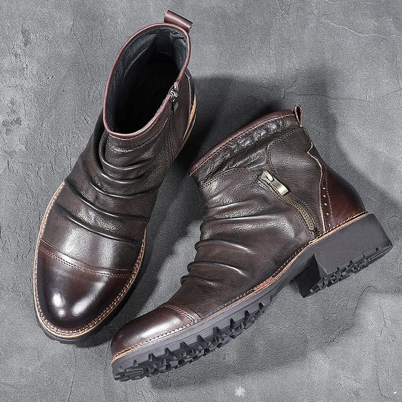 Men's black cowboy boots with side zipper, embossed texture, round toe, and a medium horseshoe heel.