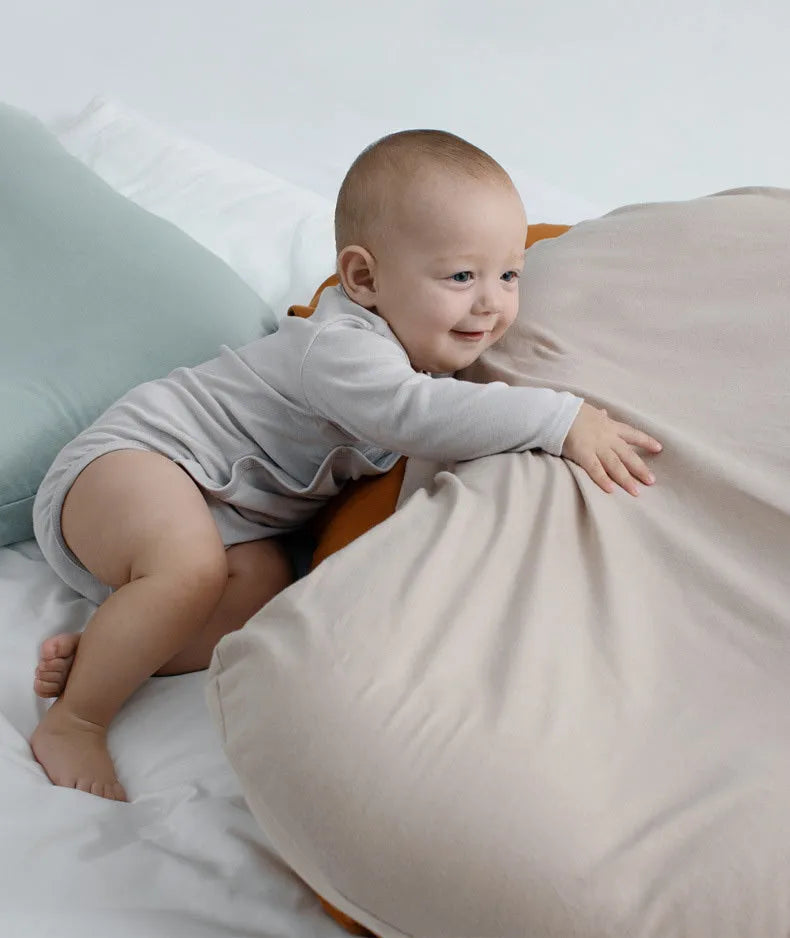 Beige portable baby nest bed crib measuring 75cm by 45cm for newborns