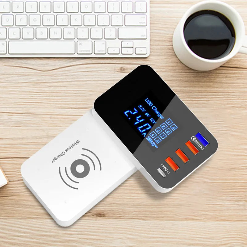 White multi-port USB and wireless fast charger with international plug adapters on a desk