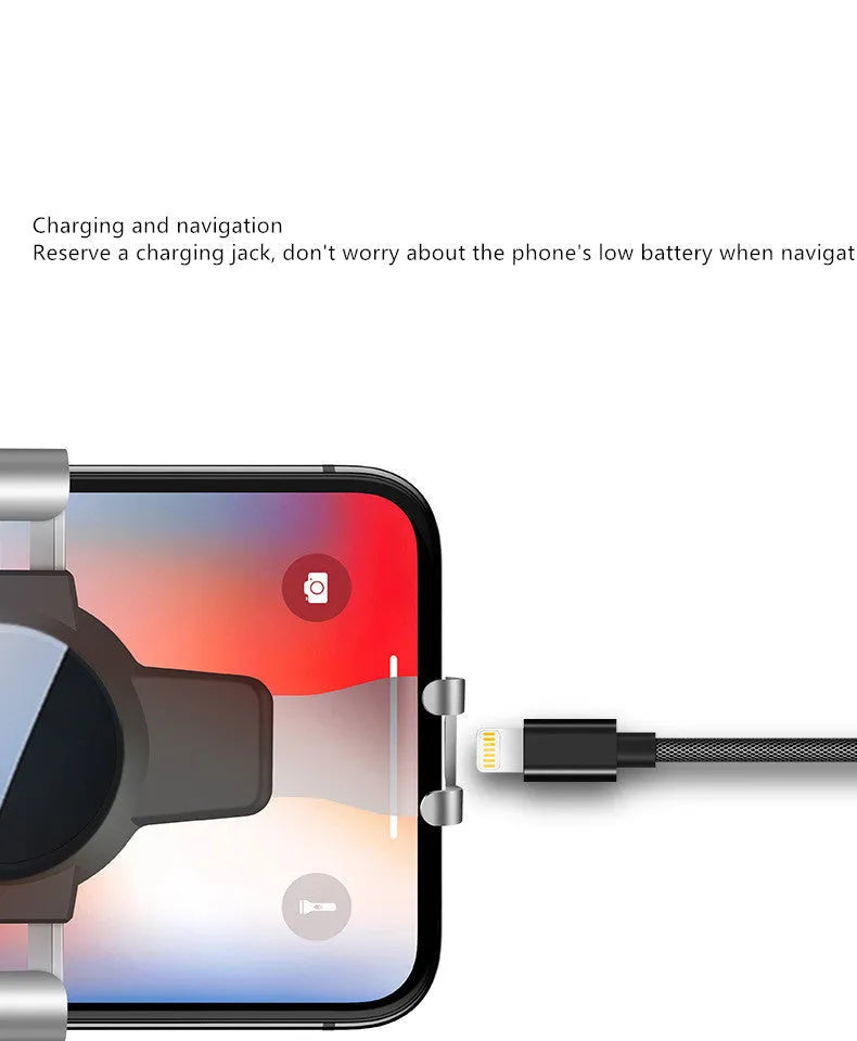 Black S4 style ABS plastic mobile phone holder mounted on a car air conditioning vent.