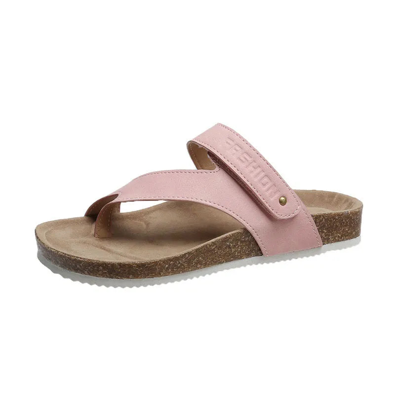 Blue thick-soled flat flip-flops with a toe ring on a foam sole.