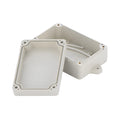 F4B-1 black ABS plastic waterproof junction box for electronic components, 100mm long.