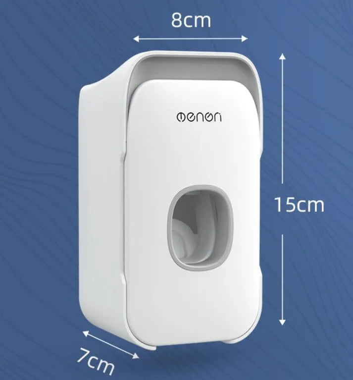 Blue automatic toothpaste dispenser mounted on bathroom wall with one-touch dispensing mechanism