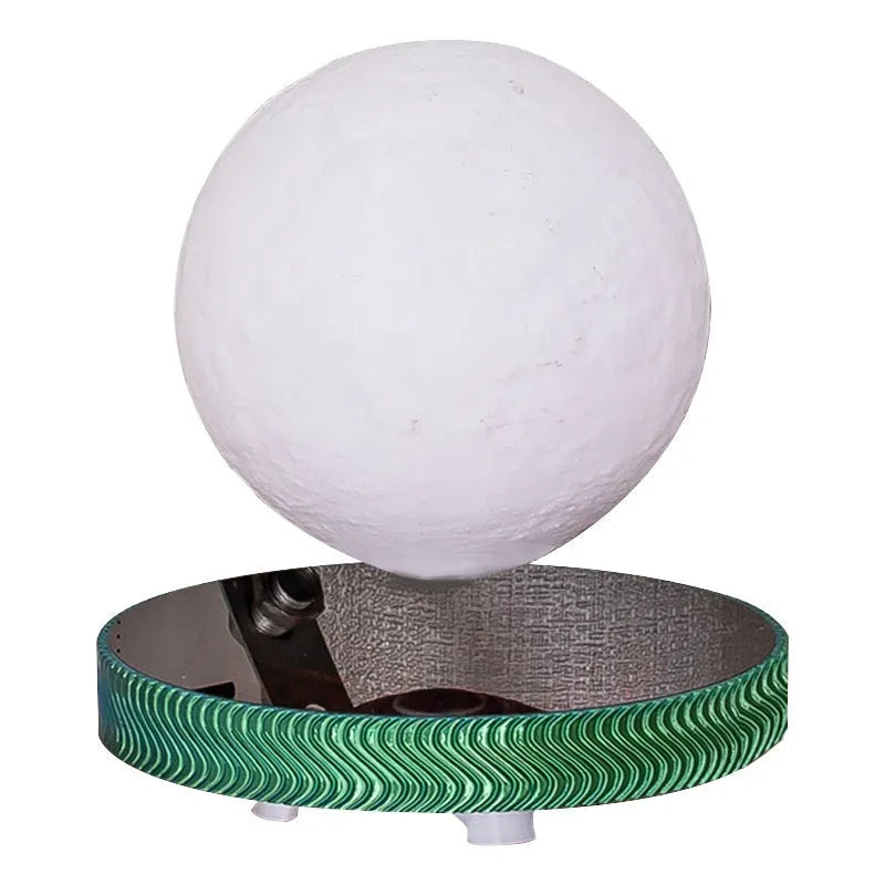 Modern magnetic suspension moon night lamp with 3D printed design on a bedside table