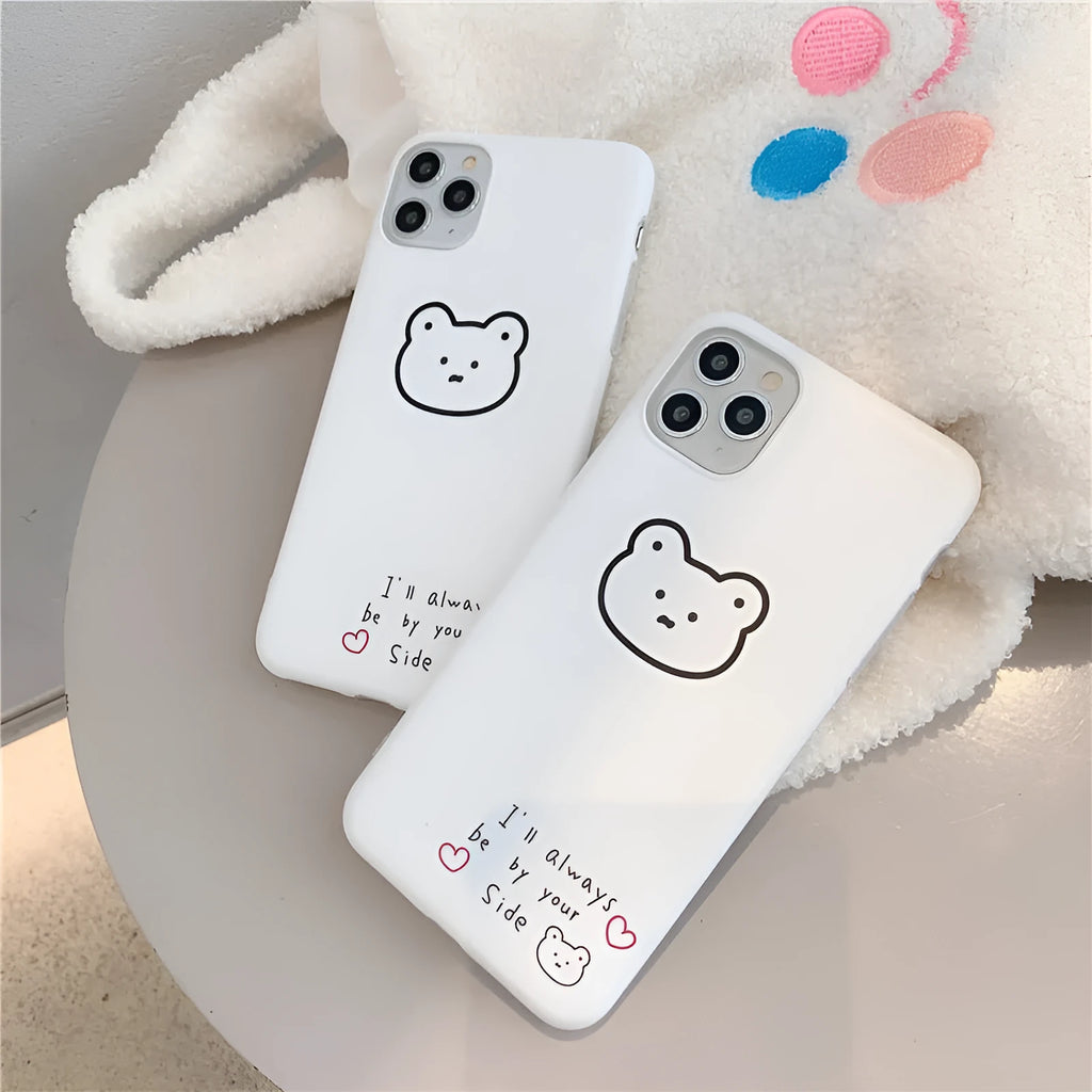 Silicone iPhone back cover case featuring a cartoon Korean bear design, shown on a mobile phone.