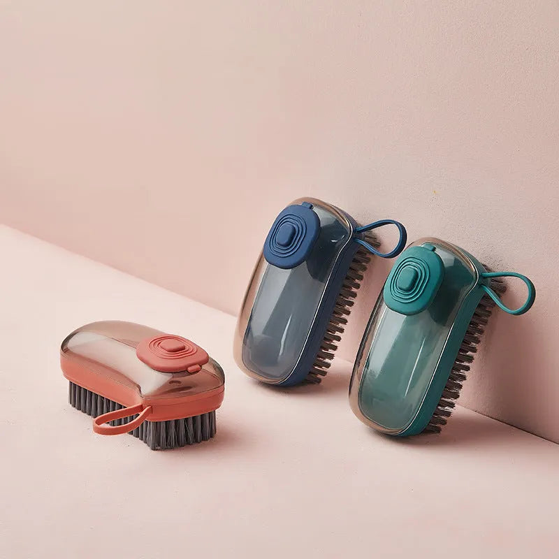 Automatic liquid cleaning brush with ergonomic grip in blue, green, or red colours with replacement heads
