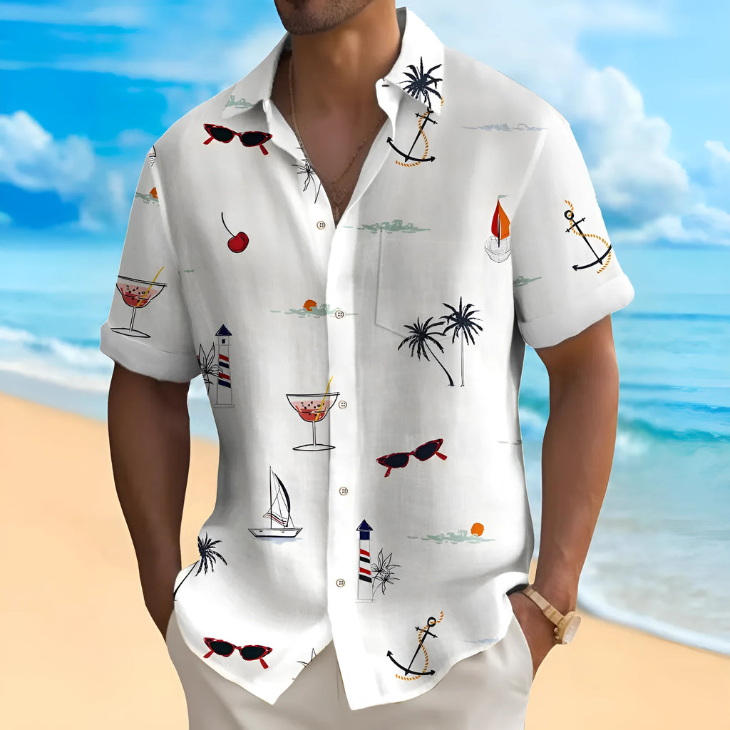 Man wearing a loose-fit, short-sleeve Hawaiian shirt with a colourful digital print pattern.