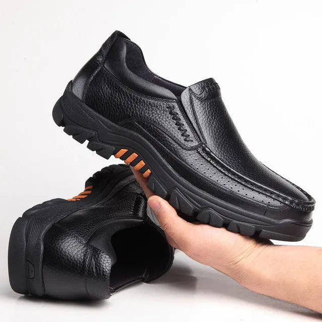 Men's black leather slip-on business casual shoes with a rubber sole