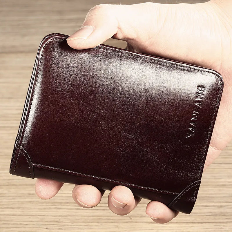 Men's leather bi-fold wallet with RFID protection in black or coffee brown