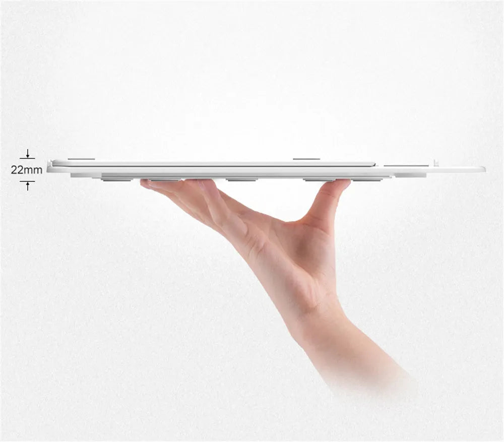 Adjustable folding laptop stand with phone holder in black, 28 cm width, plastic construction with hollow heat dissipation