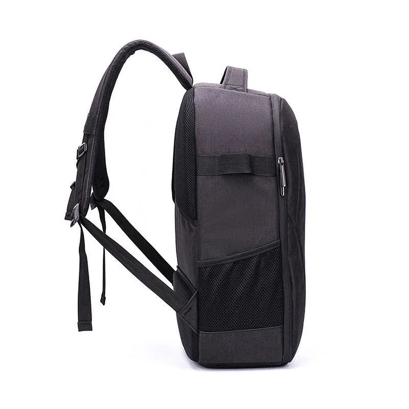 Black waterproof Oxford cloth drone backpack with multiple internal compartments for camera and laptop storage