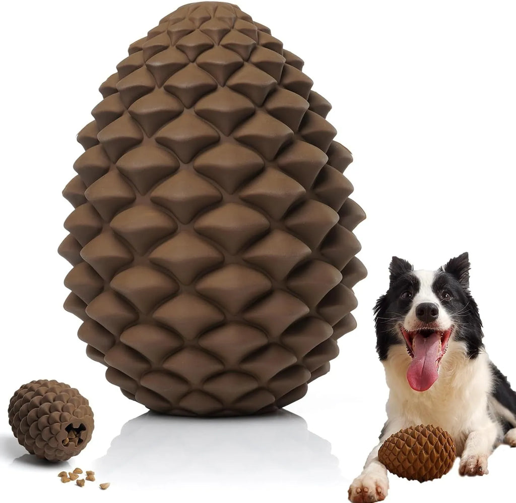 Yellow natural rubber pine cone dog chew toy with treat dispenser hole on a white background.