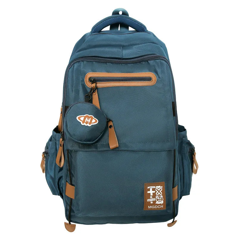 Large-capacity black nylon backpack for middle school students with curved shoulder straps and street style design