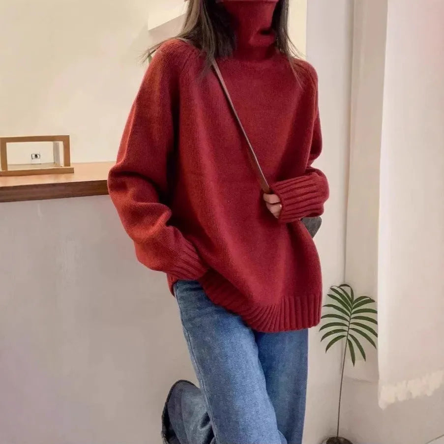 Women's loose turtleneck sweater with thick curling pile collar in solid colour