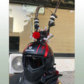 Zijin Crown black motorcycle helmet decoration with purple-gold accents and a long feather plume.
