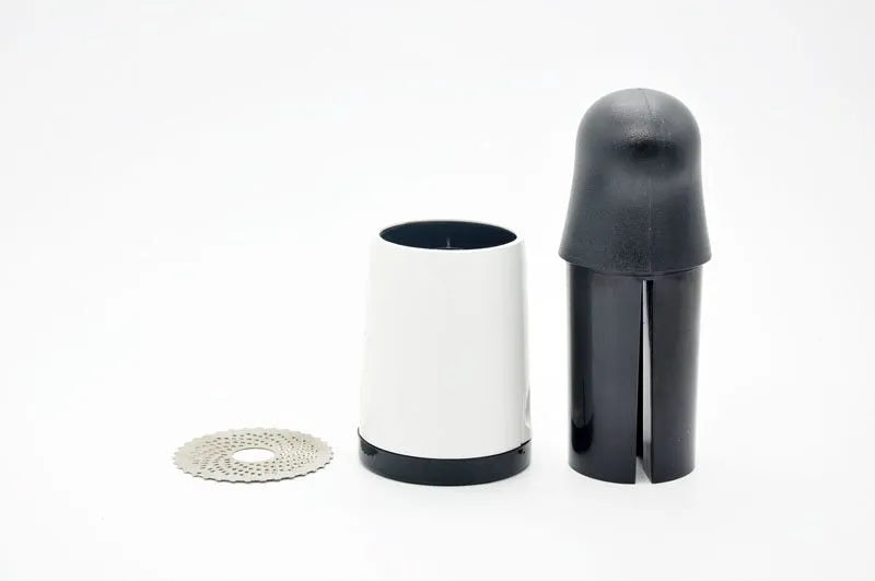 Stainless steel rotary cheese grater with black and white finish, height 17cm, diameter 7.3cm, with two blades