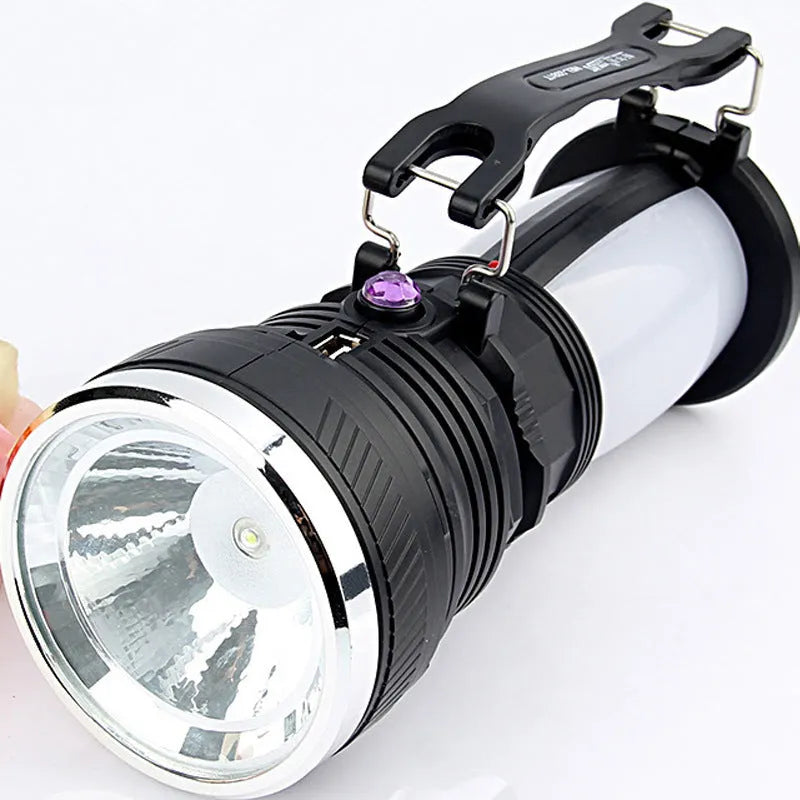 Black solar-powered LED emergency flashlight with USB charging port