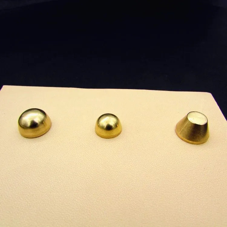 Brass decorative foot nail buckle in round and geometric designs, sizes 10x6mm and 12x7mm.
