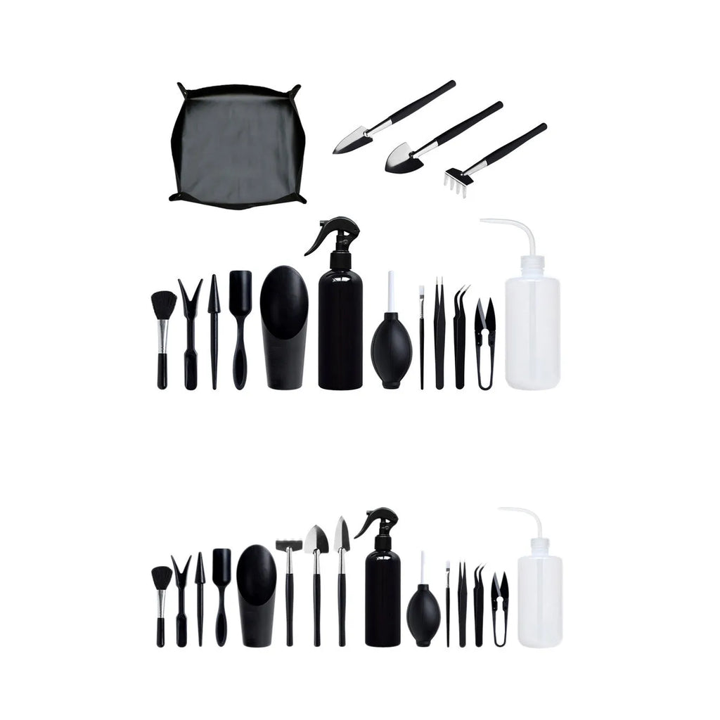 Black plastic and metal succulent plant tool set with 16 pieces including tweezers, shovel, and watering bottle on a grey cushion.