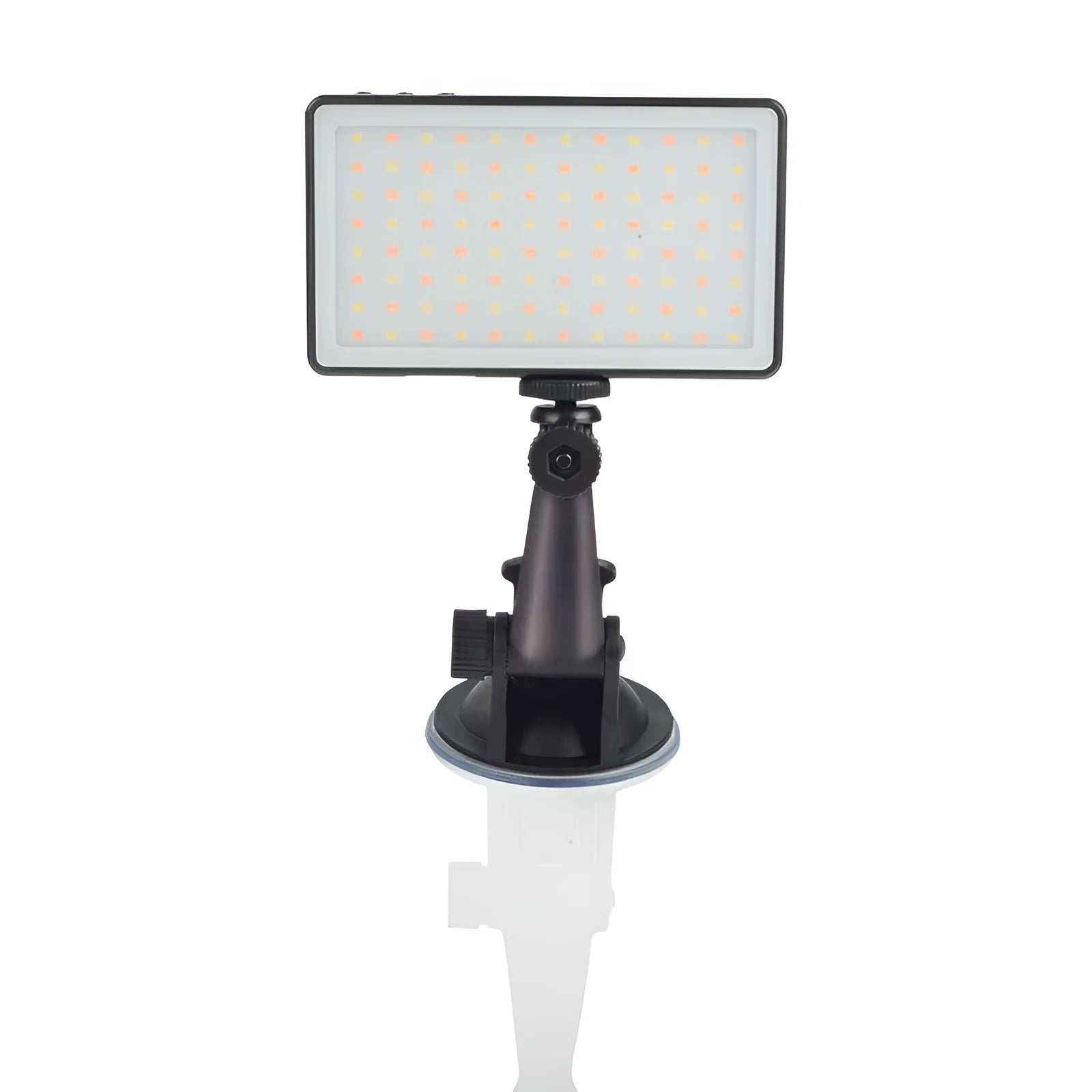 Black aluminium LED video light panel with clip mount, shown illuminating a person on a laptop video call.