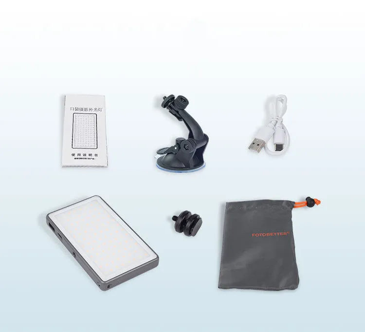 Black aluminium LED video light panel with clip mount, shown illuminating a person on a laptop video call.
