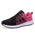 Women's white high top flat shoes with tide net design and back lacing on an EVA sole.