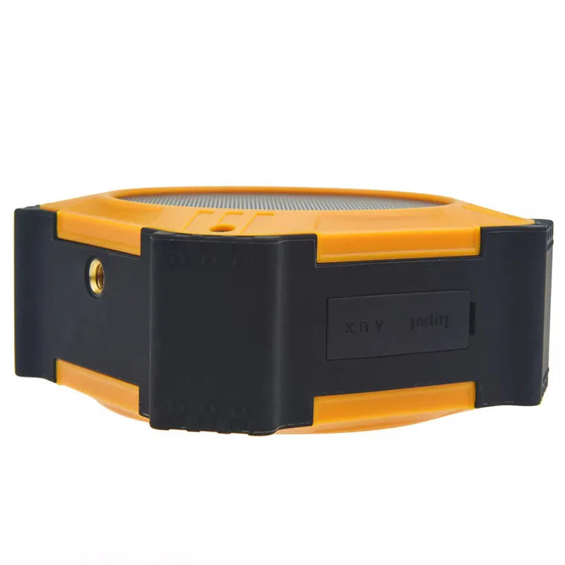 Small square black or blue waterproof portable Bluetooth speaker with a wrist strap.