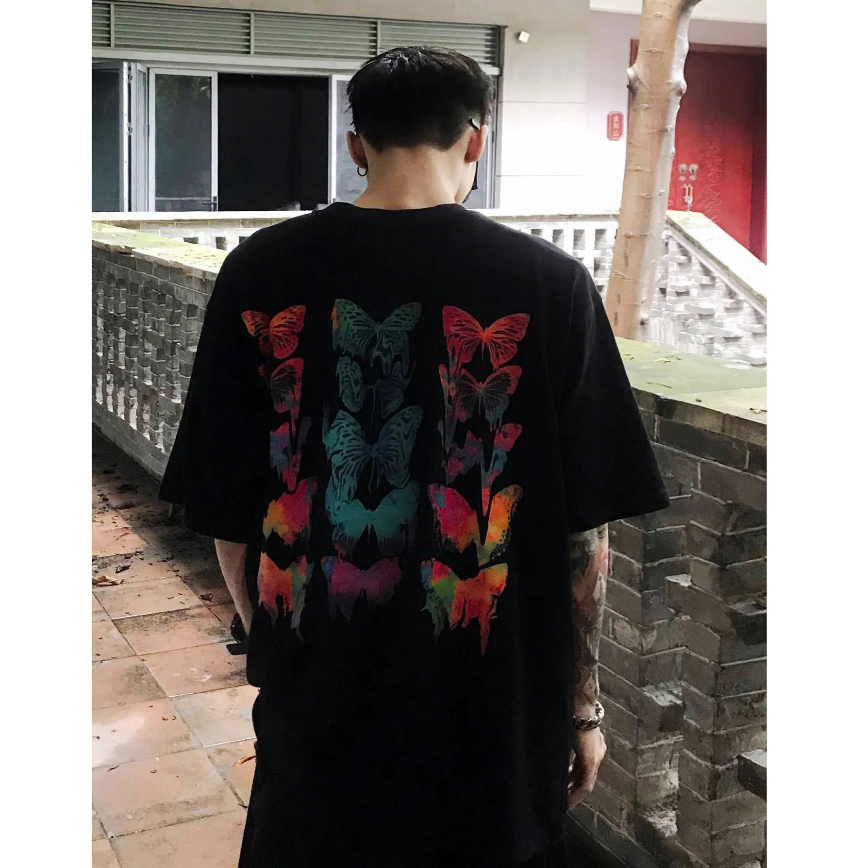Men's black loose fit short sleeve polyester t-shirt with alphabet pattern