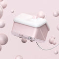 White igloo-shaped ultrasonic humidifier and essential oil diffuser with LED light on wooden table